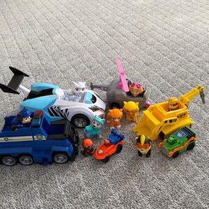 Paw patrol characters & play sets as shown.Colorful Rescue Vehicle Playsets. $35